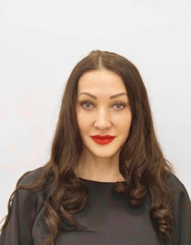 актриса Olga Merk